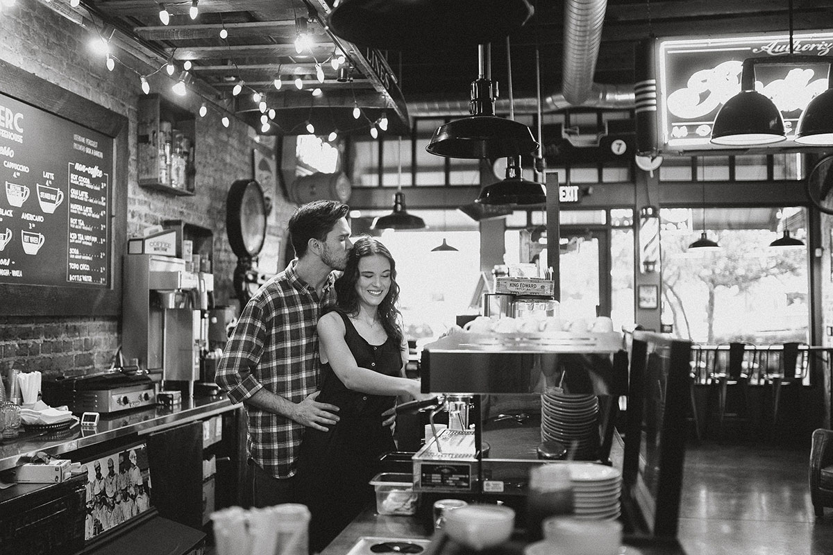 Barista couple getting engaged in Old Town Lewisville photographed by Hannah Hix