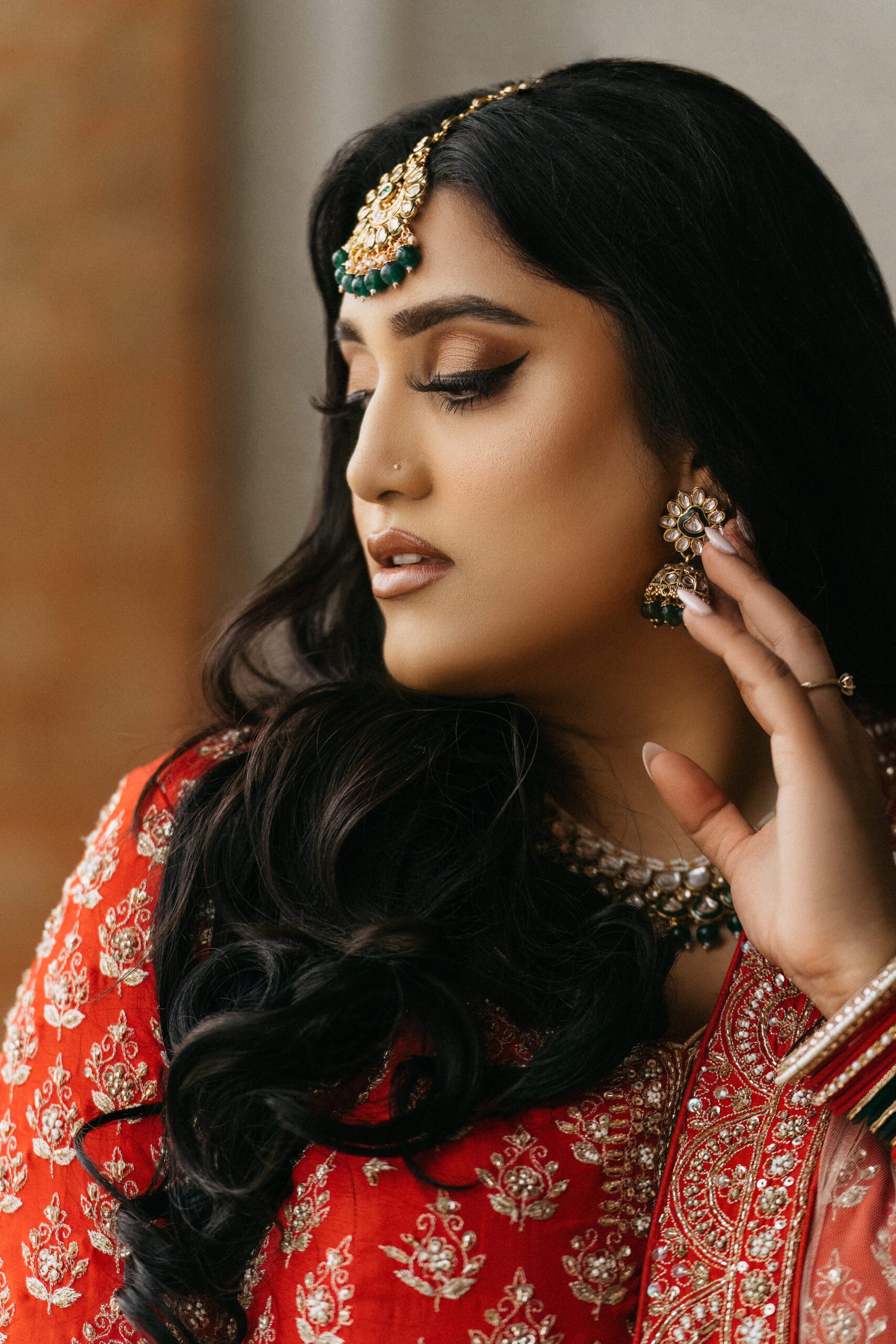 South Indian bride in red and gold